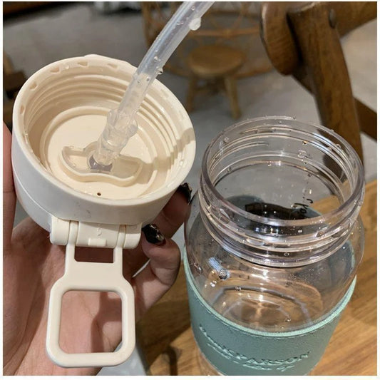 Durable BPA-free 500ml water bottle for kids with a built-in straw and flip-top lid, ideal for school, travel, and outdoor activities.