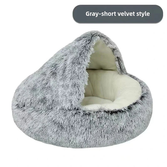 Cozy winter pet bed designed to keep cats and small dogs warm and comfortable during cold weather.