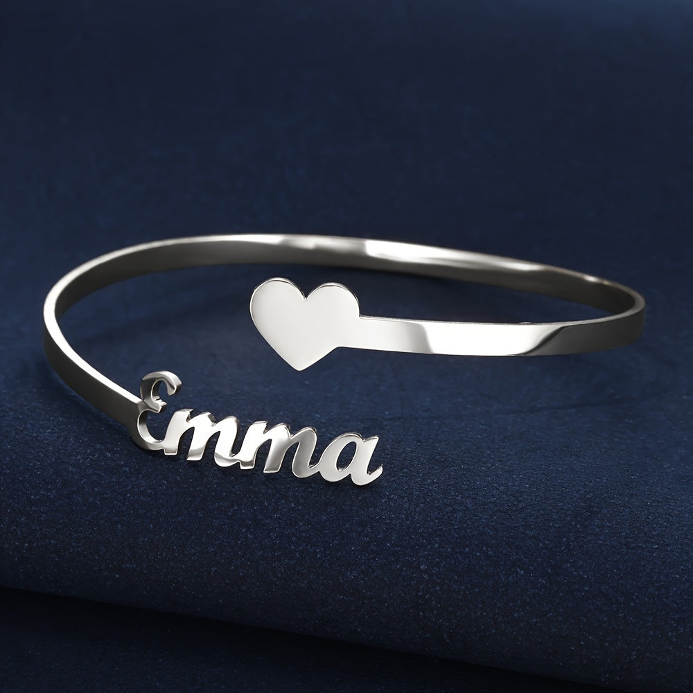 This open bangle bracelet combines personalized style with delicate craftsmanship, offering year-round charm and timeless appeal for any wardrobe.