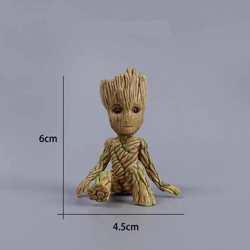 Tree Man Groot figure from Guardians of the Galaxy displayed on a shelf, showcasing its design in a collection.