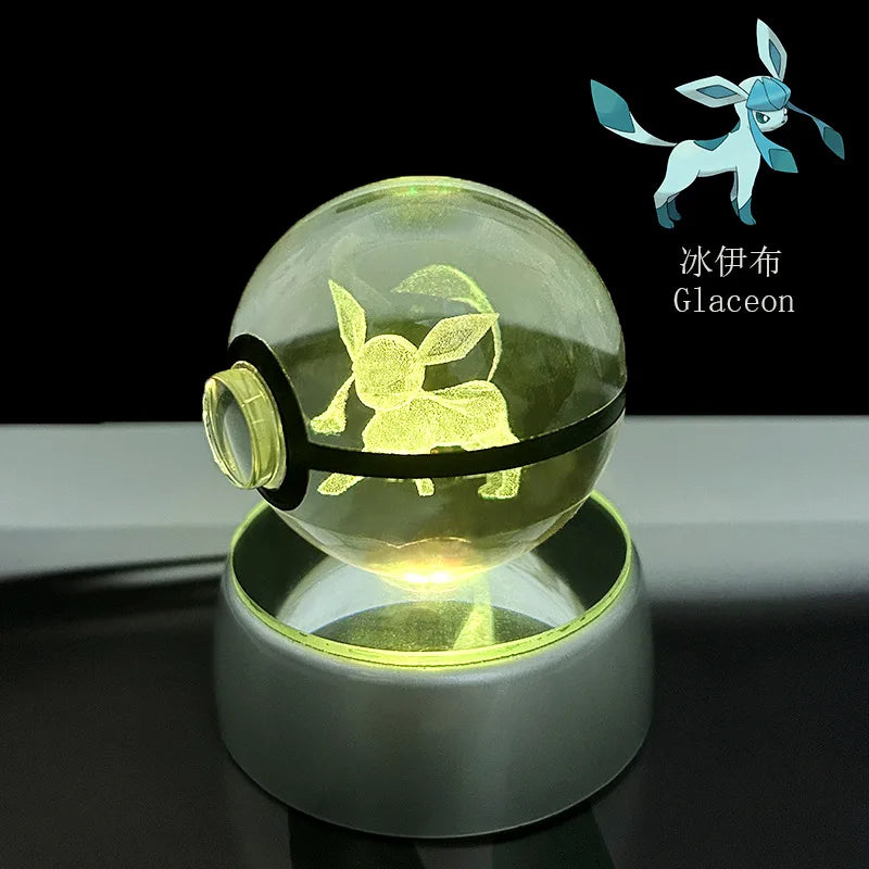 Side view of the Mewtwo Pokémon LED crystal ball, showing detailed engraving and LED illumination.