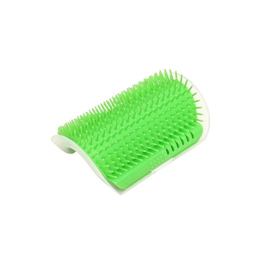 Close-up of the cat grooming brush showing soft bristles for gentle hair removal and massage.