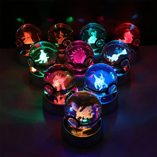 Side view of the Pikachu Pokémon 3D crystal ball night light with a glowing LED base.