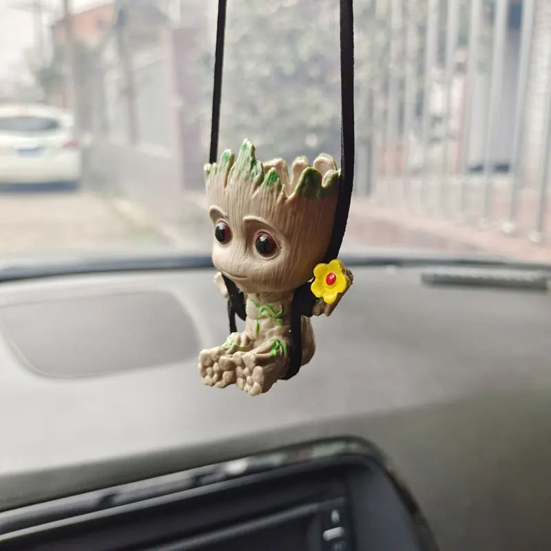 5-6cm Tree Man Groot action figure from Guardians of the Galaxy, sitting pose. A must-have collectible for Marvel fans and kids.