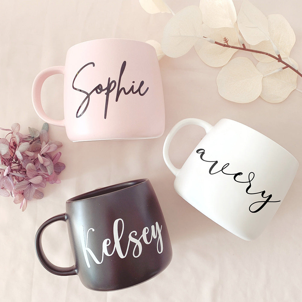 Front view of customizable ceramic coffee mug with personalized text