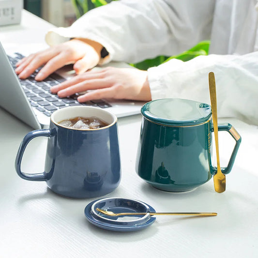 Close-up of gold-accented handle on luxury ceramic coffee mug