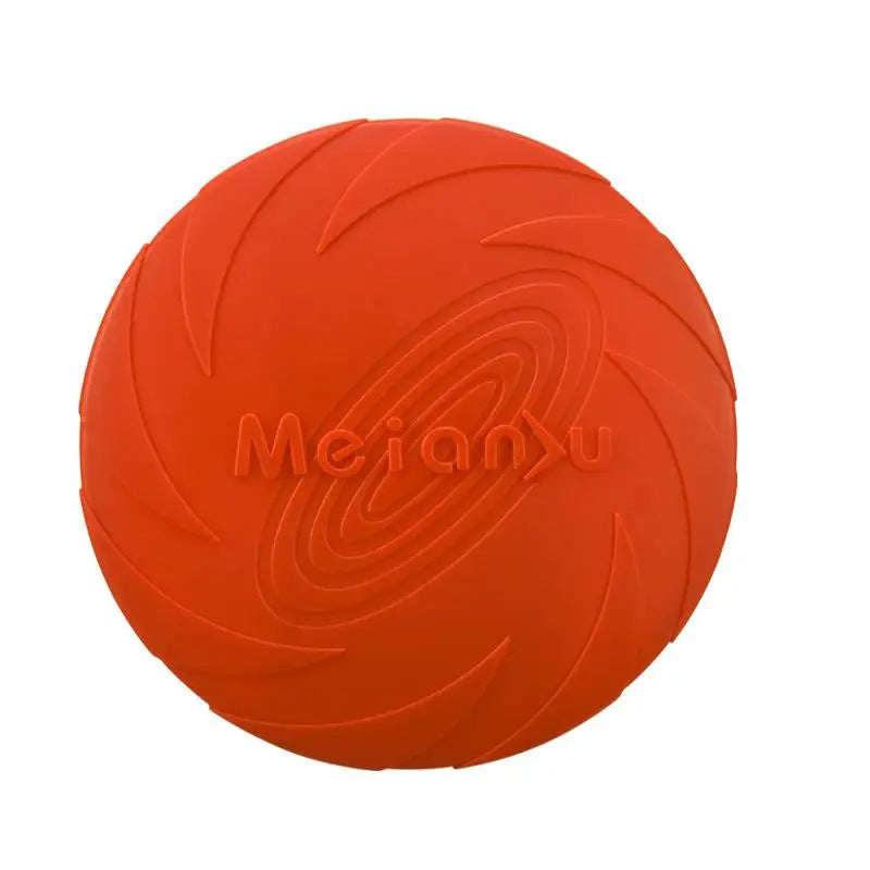 OUZEY flying disc toy resting on grass after a fun play session.