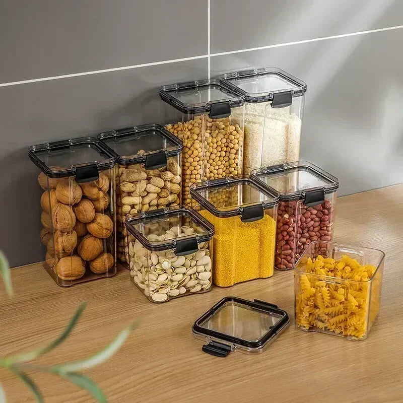 Set of airtight, stackable food storage containers for multigrain, dried fruits, tea, and pantry essentials.