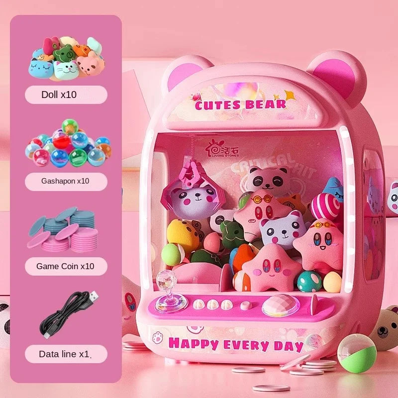 Happy child playing with the DIY claw machine, catching dolls and enjoying interactive playtime.