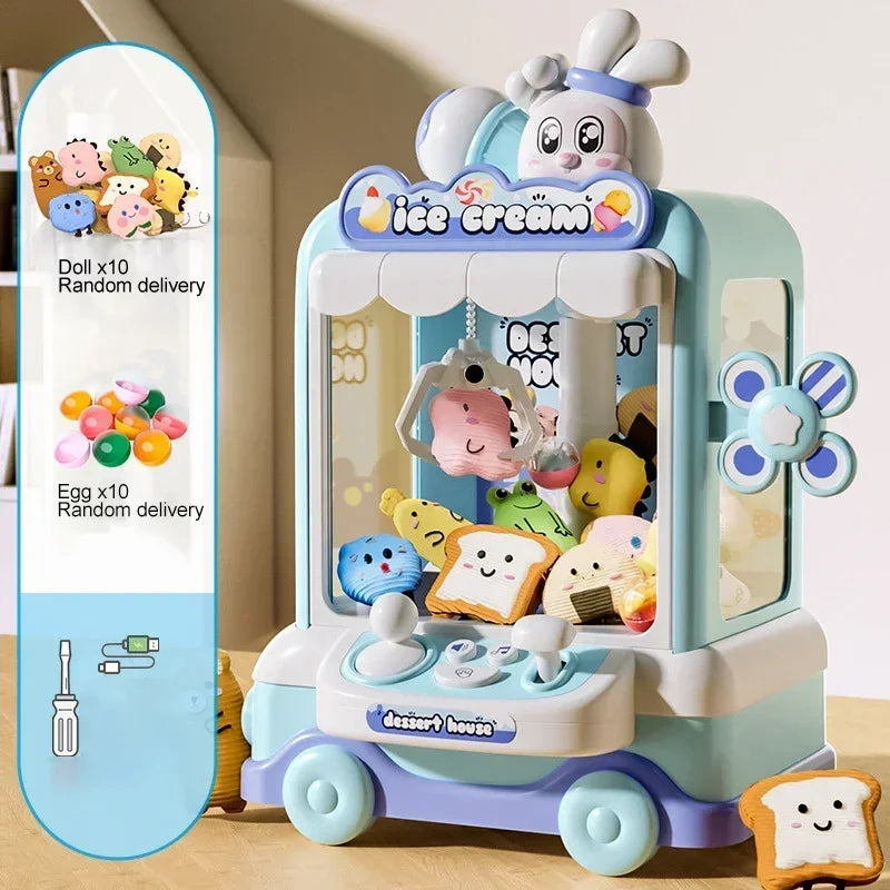 Detailed shot of the joystick, coin slot, and claw mechanism of the DIY doll claw machine for kids.