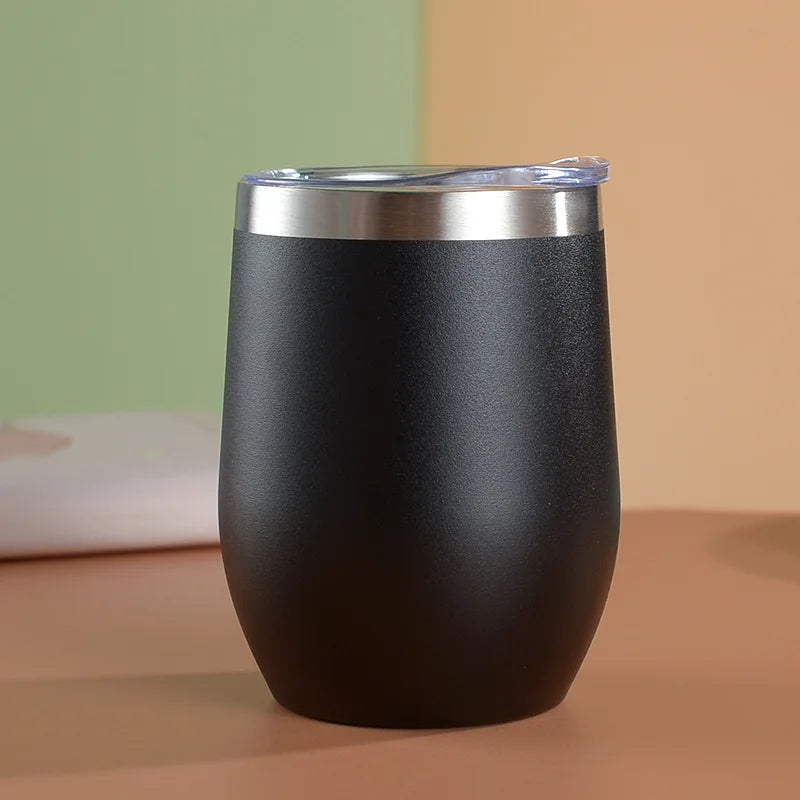 Stylish egg-shaped stainless steel insulated mug with double wall design for hot and cold drinks.