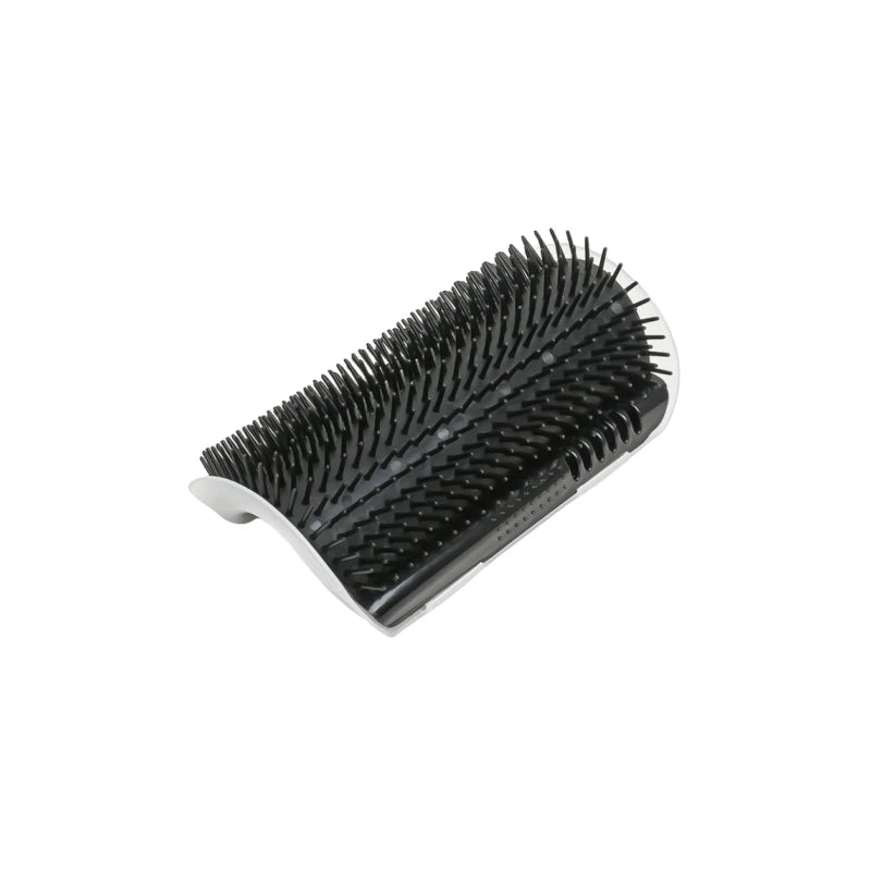 Cat grooming brush efficiently removing loose hair, suitable for cats, kittens, and small dogs.