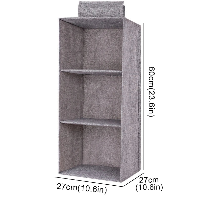 Hanging closet organizer featuring multiple pockets for easy access to clothes and accessories.