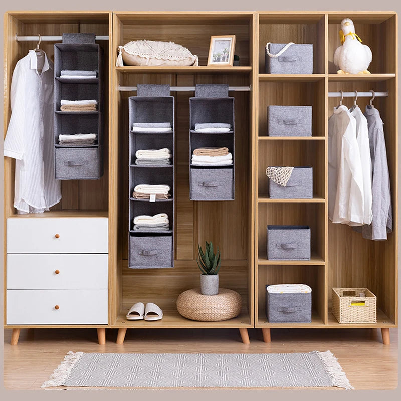 Hanging wardrobe organizer with multiple compartments for storing underwear, socks, and accessories