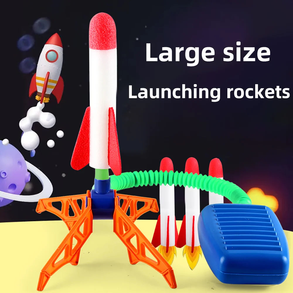 Children launching rocket with stomp power, engaging in outdoor family fun