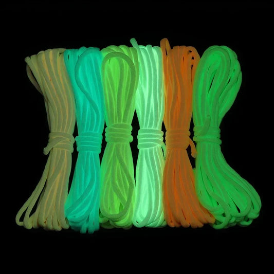 Front view of the luminous 9-strand 4mm fluorescent paracord glowing in the dark, ideal for camping and outdoor use.