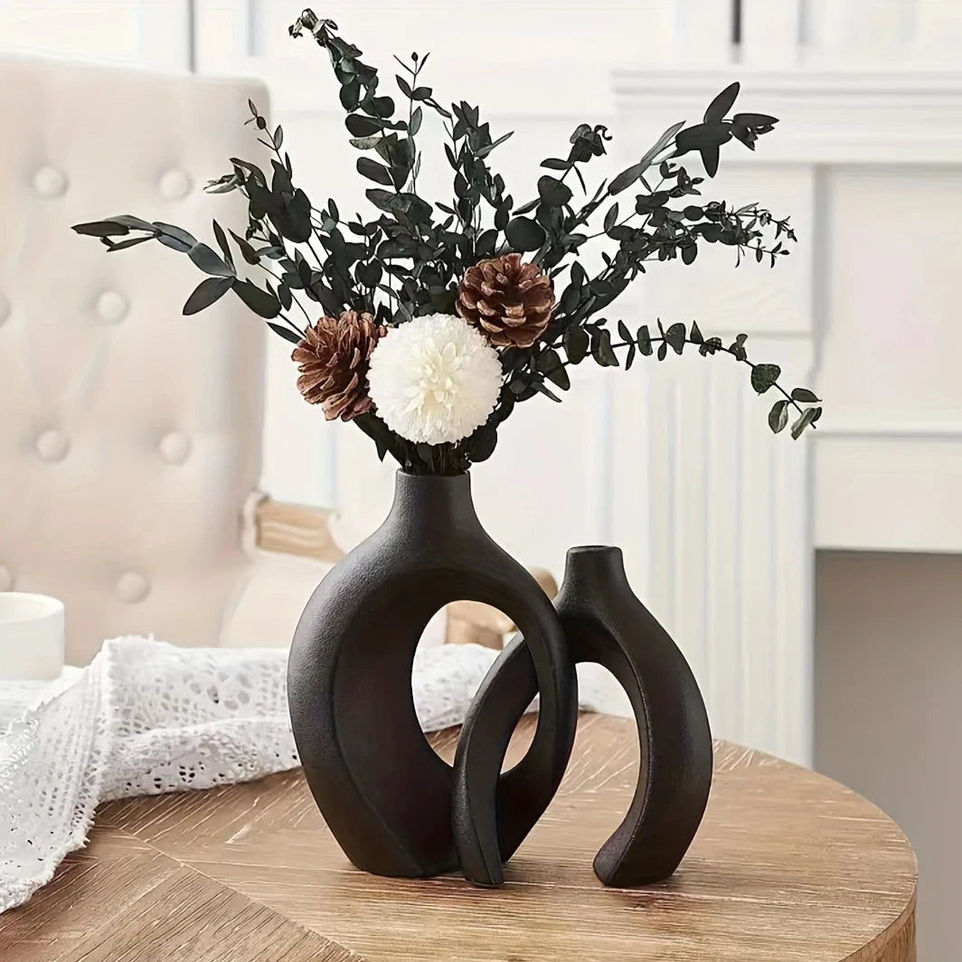 Modern boho ceramic vases set of 2 with a chic hollow design, perfect for elevating home decor in any room or space.
