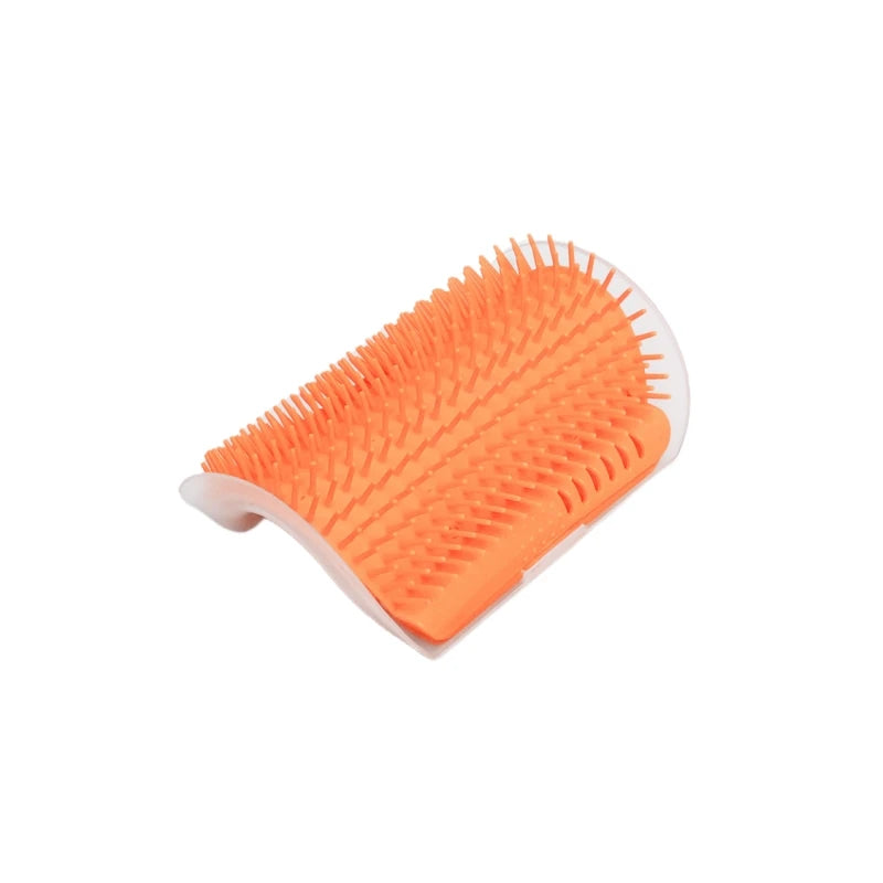 Cat enjoying the scratcher massager while hair is being removed gently