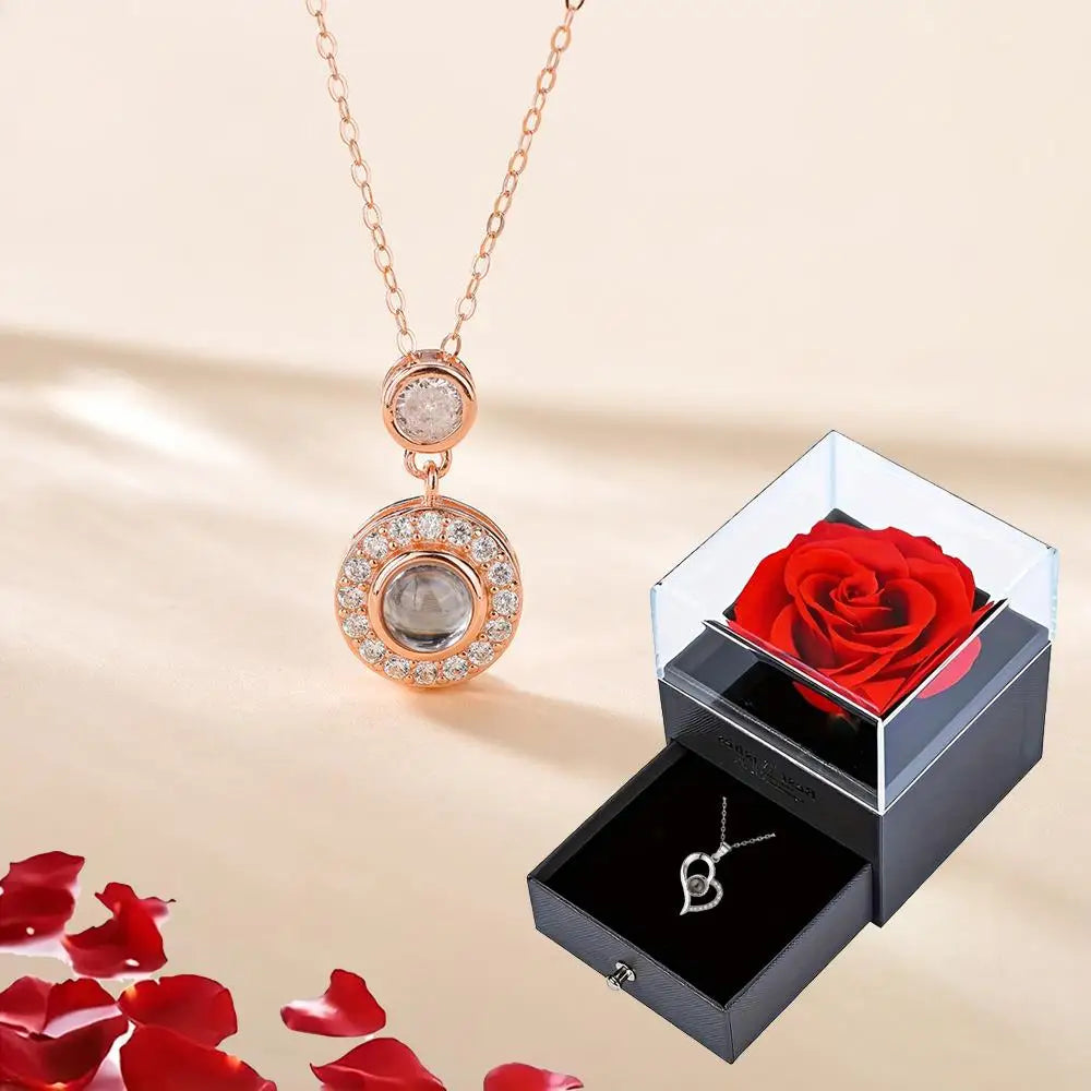 Beautiful rose gift box paired with an elegant heart pendant necklace for special celebrations.