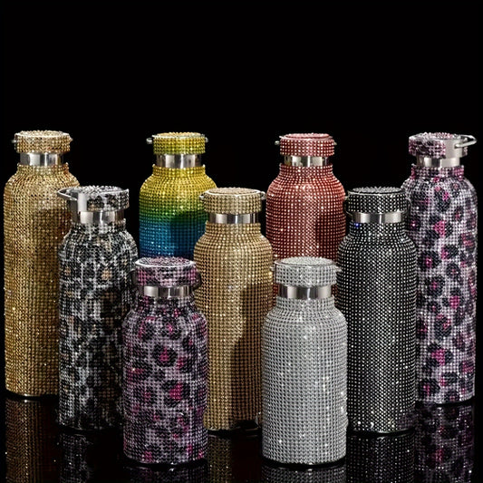 Elegant 500ml double-layer stainless steel tumbler with sparkling rhinestone exterior, perfect for keeping drinks hot or cold while adding style to your routine.