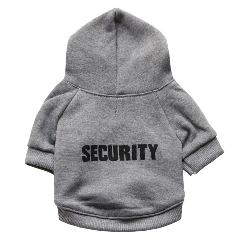 Small dog dressed in a cozy pet hoodie with "Security" print, great for cold weather.