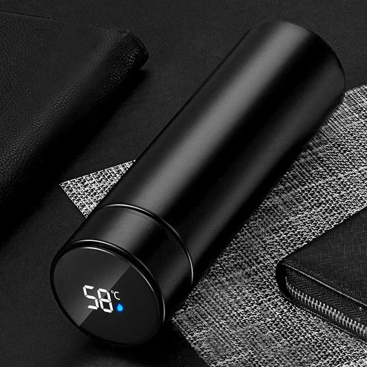 Close-up of smart LED temperature display on stainless steel vacuum flask, showing accurate drink temperature in real time