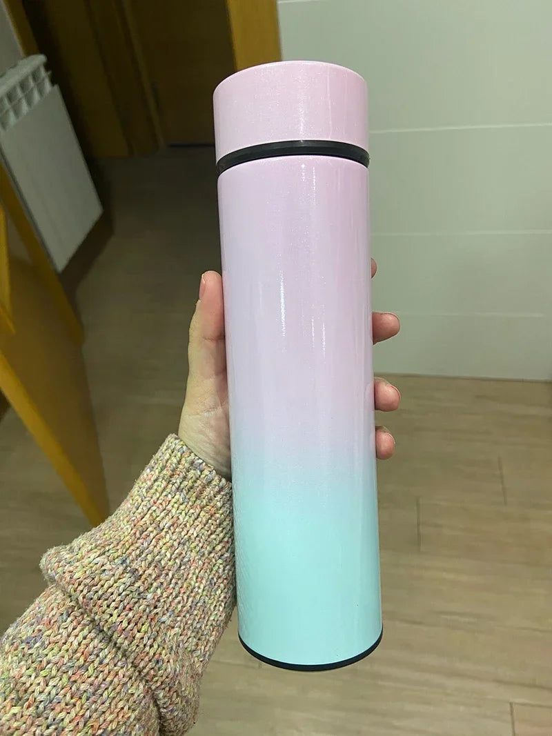 Collection of insulated stainless steel vacuum flasks in multiple colors, all featuring smart LED temperature display lids.