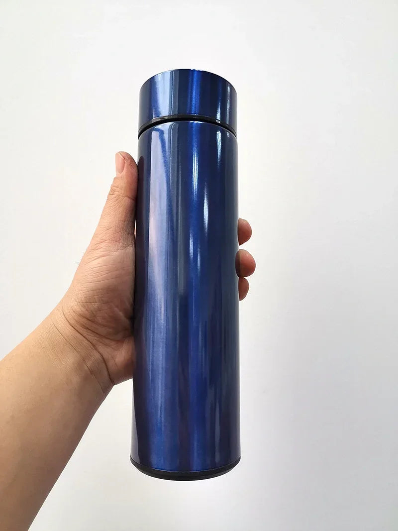 Close-up of replaceable battery compartment for smart LED temperature display on insulated stainless steel thermos