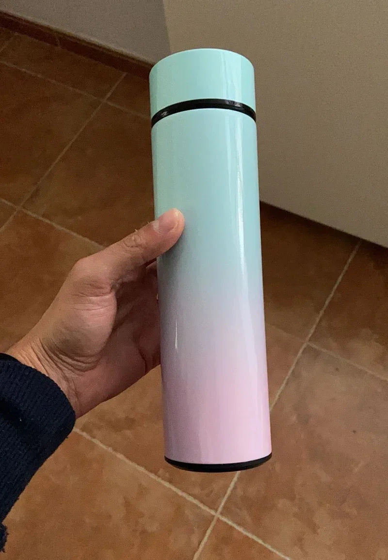 Open lid view of insulated vacuum flask, showcasing leak-proof double-wall stainless steel interior and durable construction