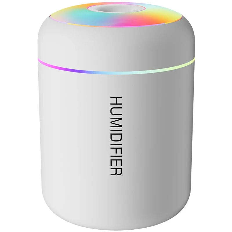 Mini USB air humidifier placed on a desk, perfect for office, home, or bedroom aromatherapy.