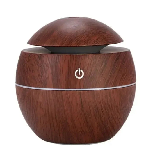 USB-powered ultrasonic cool mist humidifier with wood grain finish, doubles as an essential oil diffuser and air purifier for home or office.