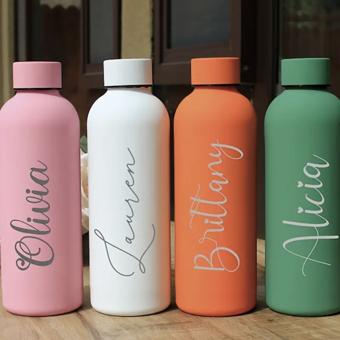 Front view of customized stainless steel insulated water bottle with name engraving