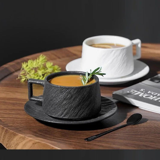 Japanese-style ceramic coffee cup set front view with rock sand texture
