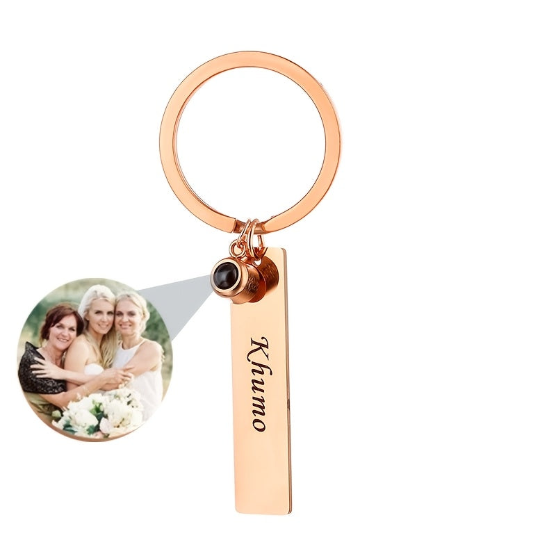 Stylish custom stainless steel keychain shown in hand for size and finish reference.

