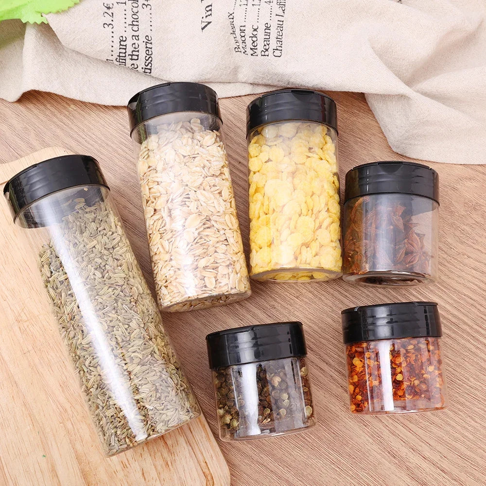Spice jars displayed neatly on a shelf rack in a modern kitchen