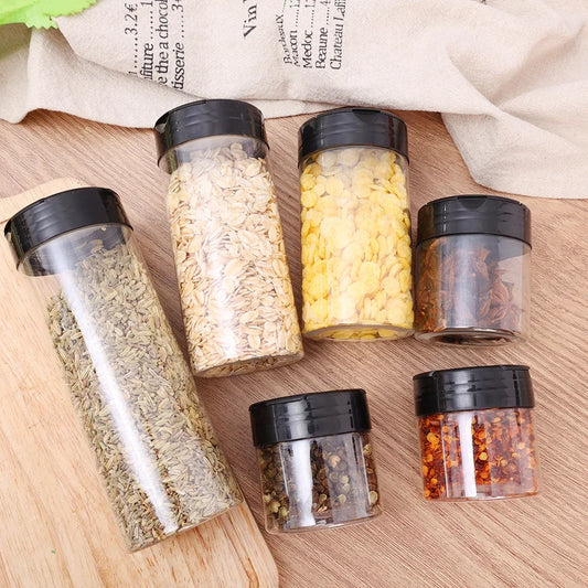Spice jars displayed neatly on a shelf rack in a modern kitchen