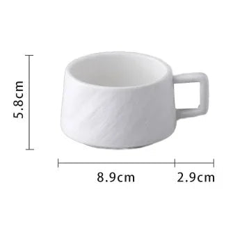 Japanese ceramic tea cup set displayed with flower tea arrangement