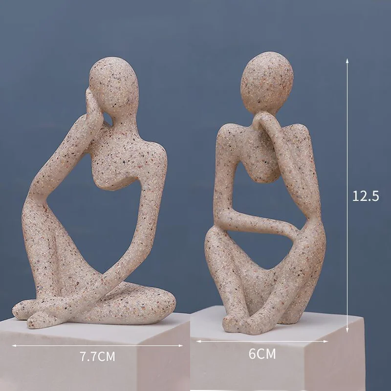 Close-up of The Thinker yoga figurine – smooth sand finish sculpture