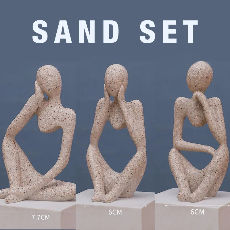 Scandinavian living room with The Thinker abstract statues on display
